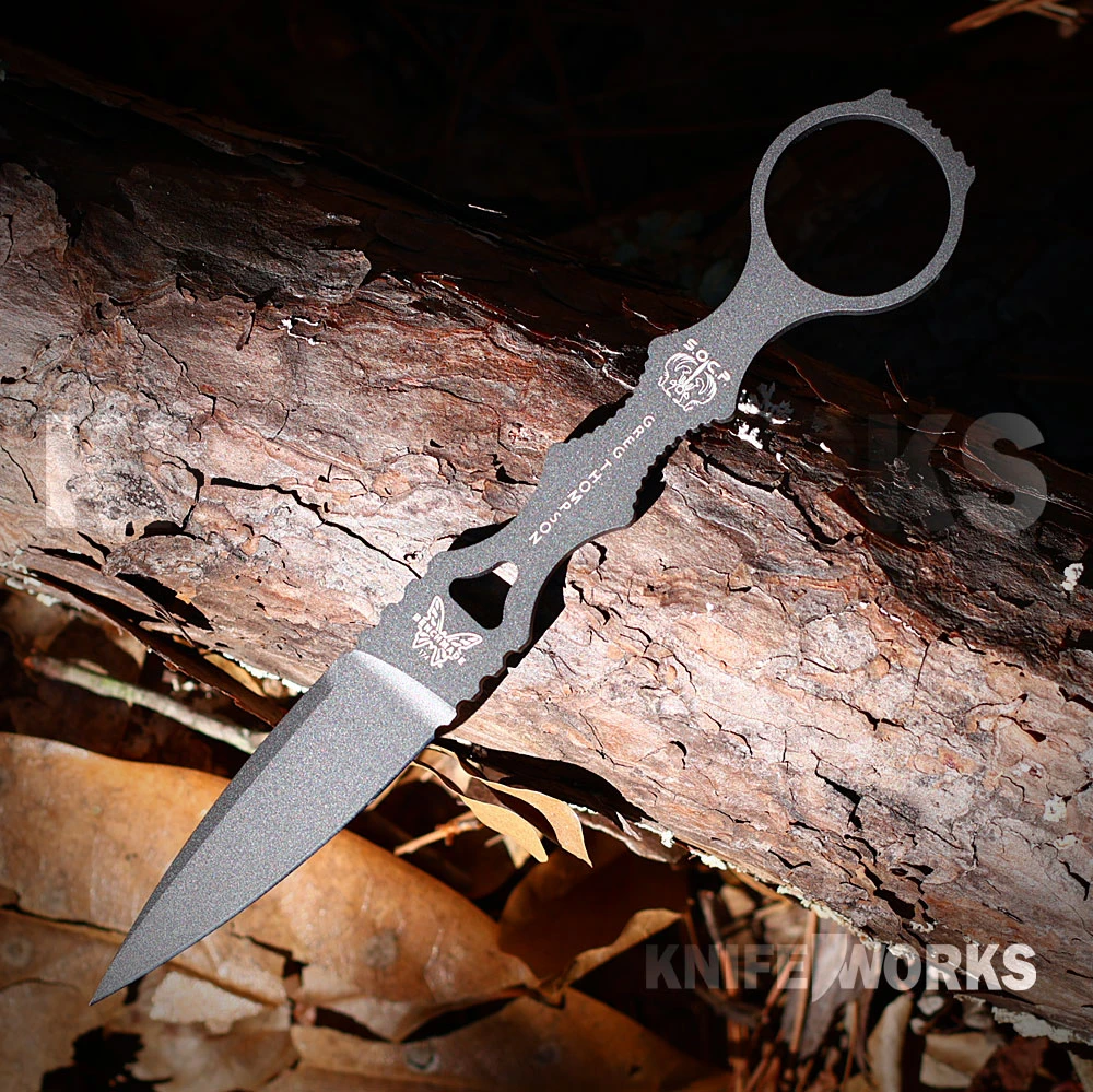 The Benchmade SOCP Tactical Folder 174GY is shown open, featuring a 4.47-inch gray PVD coated D2 tool steel single-edge dagger blade extending from a gray 6061-T6 aluminum handle with an integrated retention ring, thumb disc, and AXIS Lock.