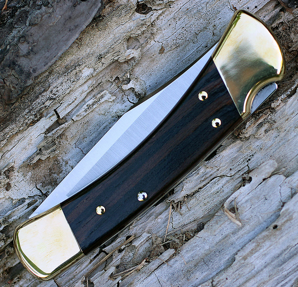 Buck 110BRSA ebony handle automatic knife