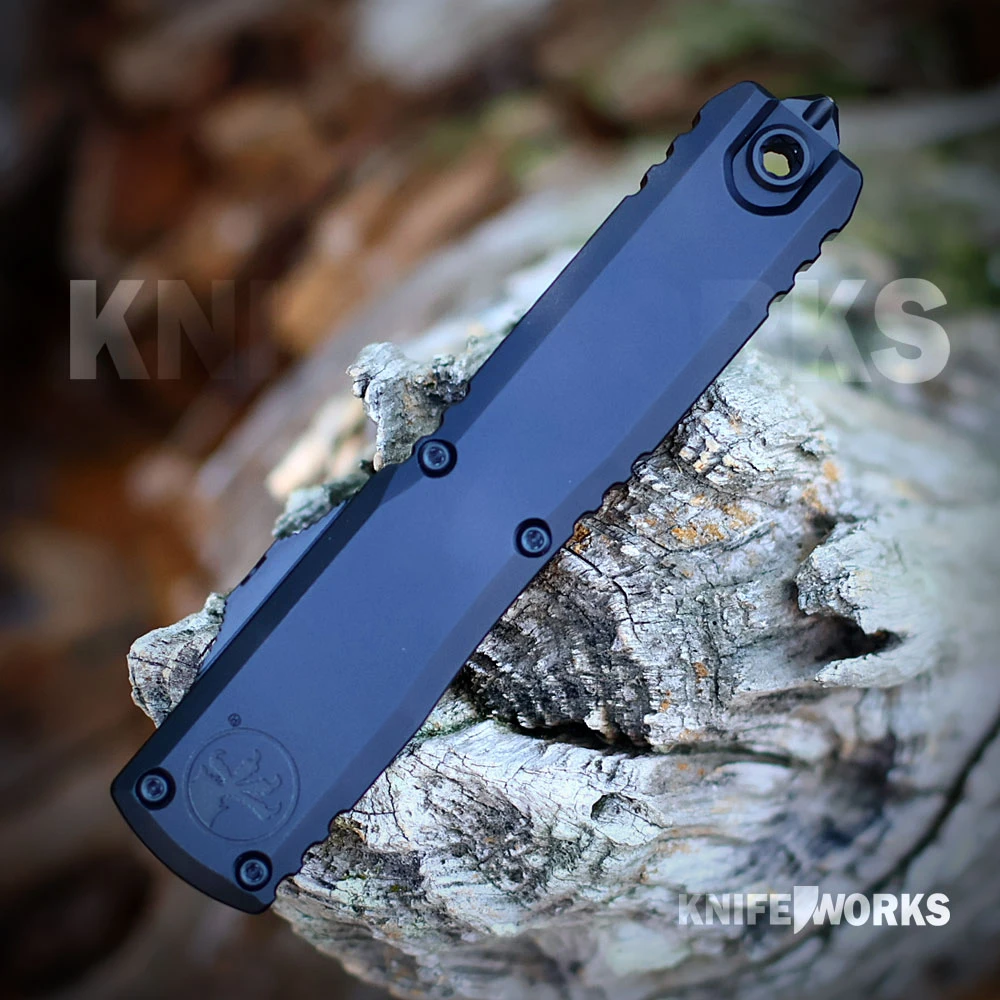 Microtech Ultratech Gen III ZBP 1123-1T double action OTF, blade deployed, black M390MK tanto blade, black aluminum handle