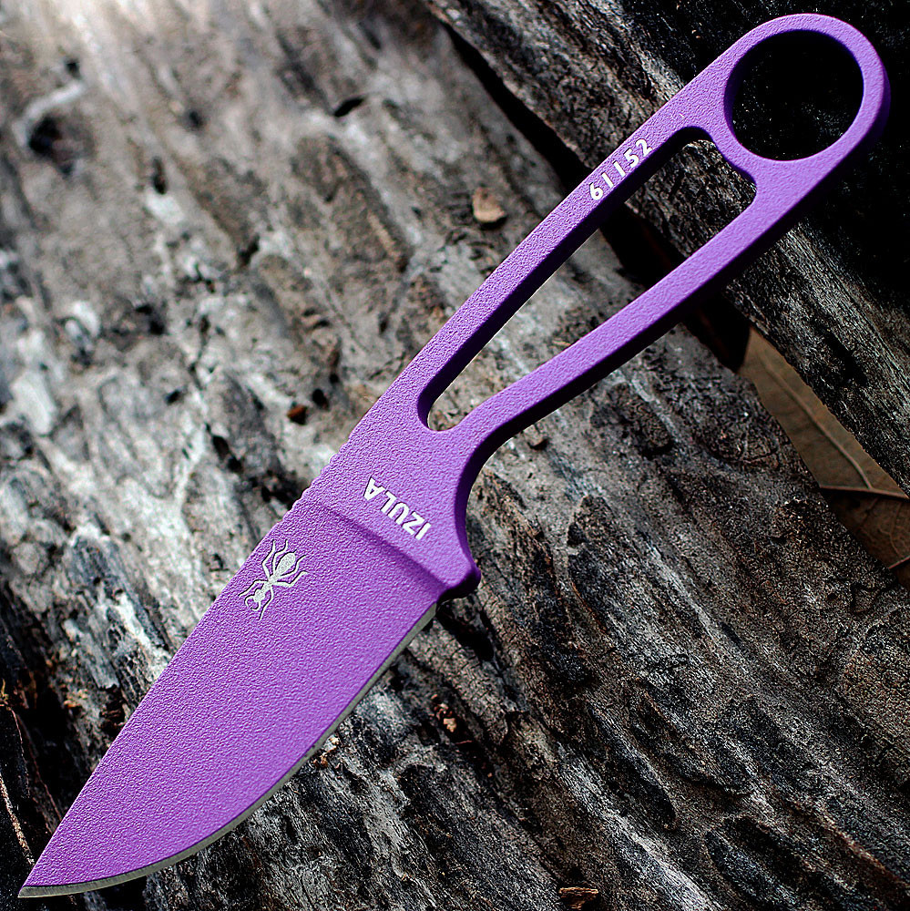 The ESEE Izula (IZULA-PURP-BLK) shown with its 2.63-inch 1095 plain edge drop point blade in a Purple finish and flat grind, matching Purple skeletonized steel handle, and its injection-molded black polymer sheath.
