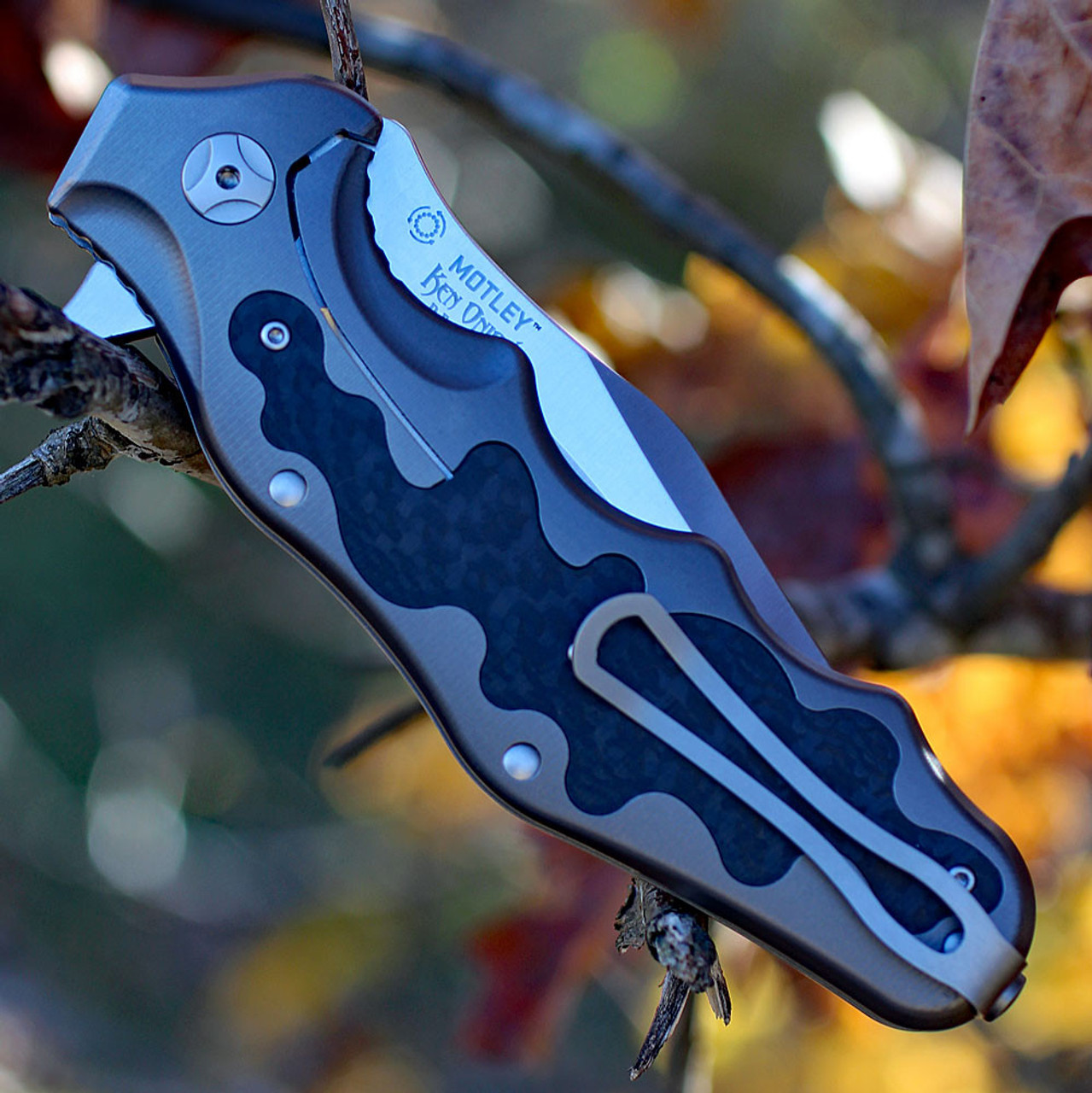 CRKT Ken Onion Motley (CRK210CFXP) 3.875" Sleipner Clip Point Plain Blade, Matte Finished Titanium Handle with Gray Carbon Fiber Inlay