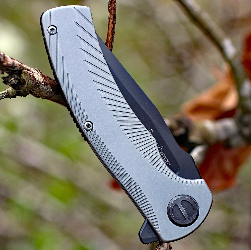 Kershaw Seguin 3490 assisted opening knife open view showing the gray drop point blade and milled stonewashed stainless steel handle.