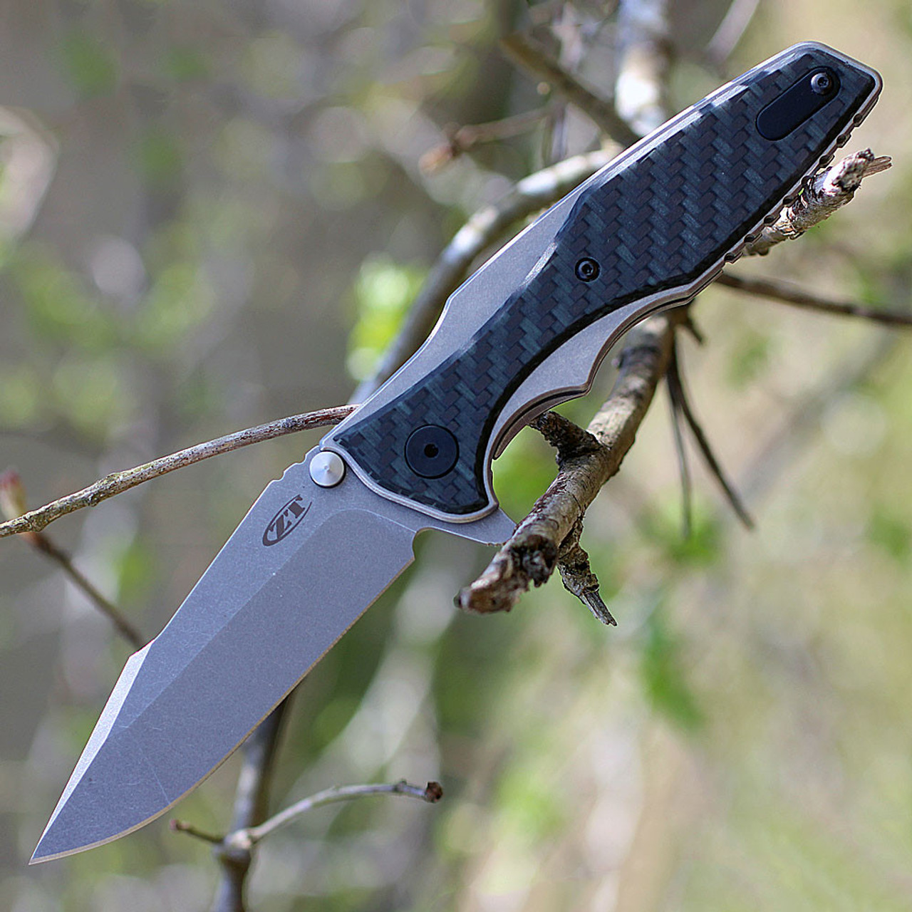 Zero Tolerance 0393GLCF, 3.5" CPM 20CV Plain Blade, Titanium/Glow in the Dark Carbon Fiber Handle