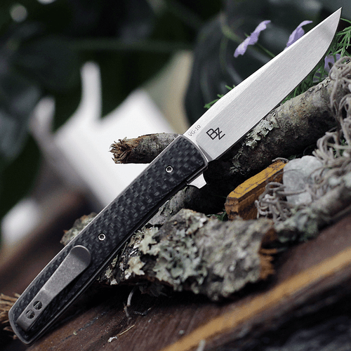 Boker Plus Urban Trapper Carbon Fiber 01BO733 back view highlighting the titanium liners and slim deep-carry pocket clip.