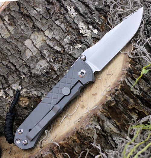 Chris Reeve Umnumzaan UMN-1000 CPM MagnaCut 3.67 in stonewash drop point — hollow grind, 63-64 HRC, 0.14 in thick, plain edge