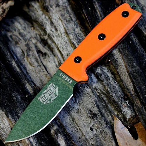 The ESEE-3 (ESEE-3PM-MB-OD) shown with its 3.88-inch 1095 plain edge drop point blade in an OD Green finish and flat grind, orange G-10 handle scales with a modified pommel, and its injection-molded black plastic sheath with MOLLE back mounting.