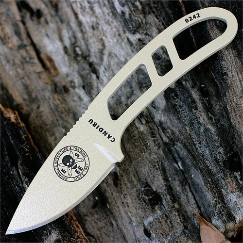 The ESEE Candiru Survival Kit (ESEE-CAN-DT-KIT) shown with its 2.00-inch 1095 plain edge drop point blade in a Desert Tan finish and flat grind, matching Desert Tan skeletonized steel handle, black polymer sheath, and the full kit: paracord, cord lock, split rings, ferro rod, whistle, and snap hook.
