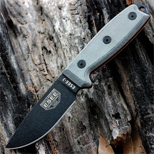 The ESEE-3 (ESEE-3P-B) shown with its 3.88-inch 1095 black plain edge drop point blade and flat grind, gray Micarta handle scales, and its injection-molded black plastic sheath.