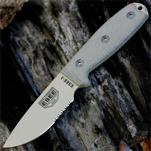 The ESEE-3 (ESEE-3SM-MB-DT) shown with its 3.88-inch 1095 part serrated drop point blade in a Desert Tan finish and flat grind, tan Micarta handle with a modified pommel, and its injection-molded OD Green plastic sheath with MOLLE back mounting.