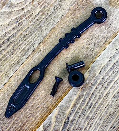 The ESEE Izula/Imlay Secondary Retention Kit (ESEE-RENTENTION-KIT) shown with its black rubber retention strap, sheath button post, and screw assembly for mounting on Izula and Imlay sheaths.