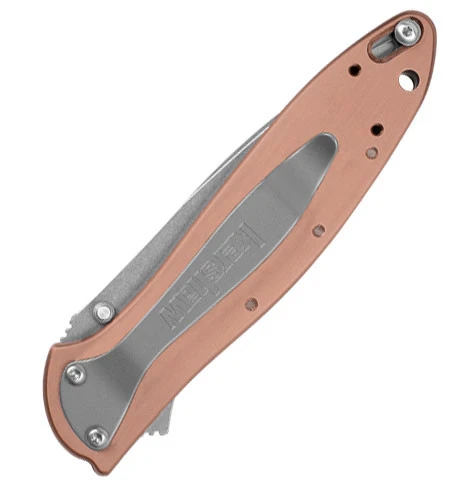 Kershaw 1660CU genuine copper handle highlighting the metallic finish and Tip-Lock safety slider.