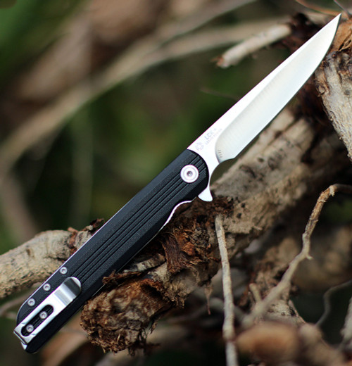 Matthew Lerch designed CRKT LCK+ Large showing black GRN handle texture.