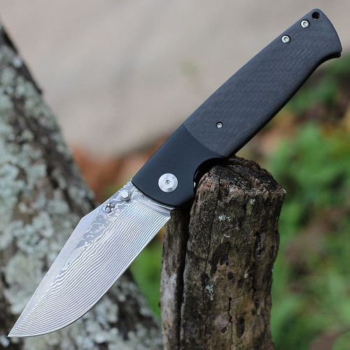 Kansept Shikari (K1027A4) 4" Damascus Clip Point Plain Blade, Black Titanium & Twill Carbon Fiber Handle