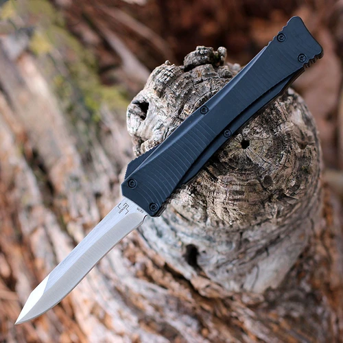 Boker Plus Falcon 2.0 OTF 06EX245 open — D2 satin recurve plain edge blade deployed, titanium-coated black aluminum handle, double-action slide