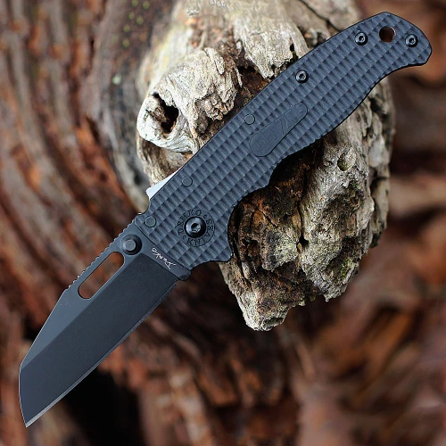The all-black Demko AD20.5 Shark Lock open, showing its 3.25-inch black-finished, flat-ground AUS-10A Shark Foot blade with a straight plain edge, black textured Grivory scales over steel liners, the spine-mounted Shark-Lock fin, a thumb stud and thumb hole, and a tip-up pocket clip.