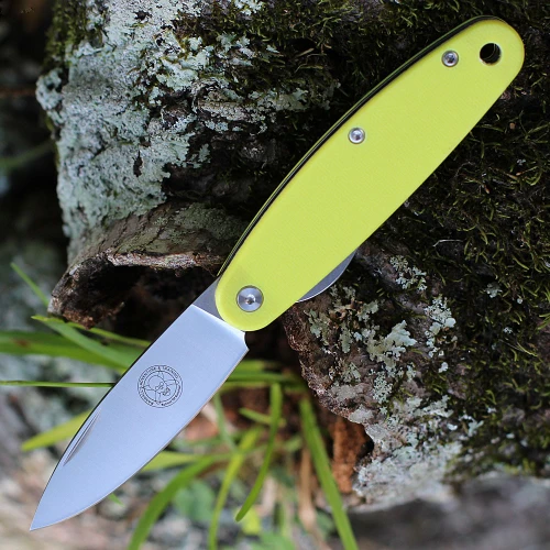 The BRK Churp (BRKC5) shown with its 2.75-inch D2 spear point blade in a satin finish and flat grind, Burnt Orange G-10 handle with liner lock, and tip-up pocket clip.