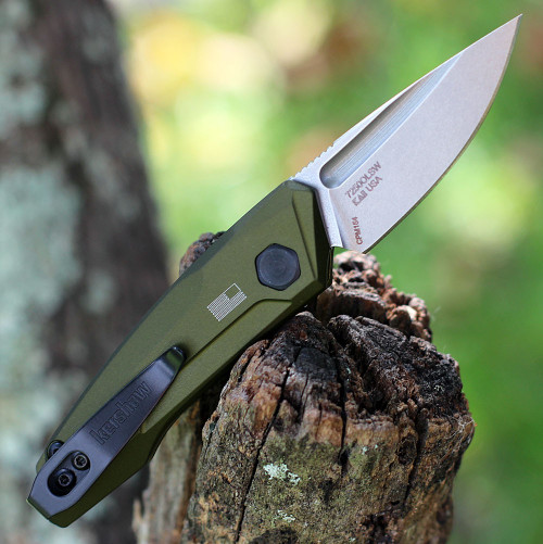 Kershaw Launch 9 being deployed showing the compact size and deep-carry pocket clip.