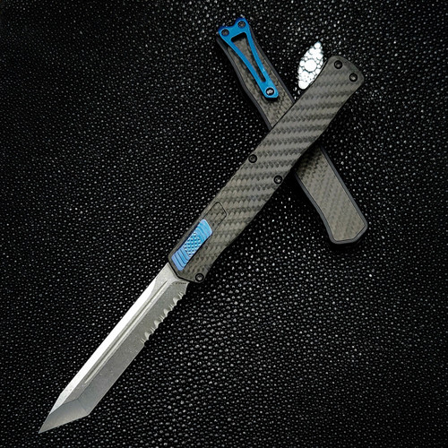 Heretic Cleric II OTF Automatic (H019-2B-CF/BLU) - 4.25in Stonewash CPM Magnacut Tanto Partially Serrated Blade, Black Anodized Aluminum/Carbon Fiber Inlay Back Handle, Carbon Fiber Front Handle, Black Hardware , Blue Ti Clip, Blue Thumb Slide