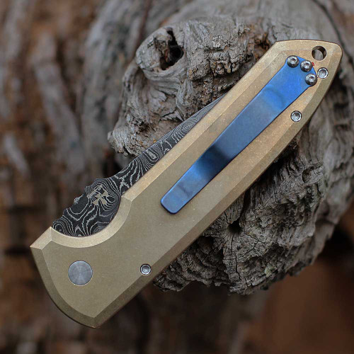 Pro-Tech 2024 Rockeye Custom 001 - 3.4" Chad Nichols Virus Damacus Drop Point Plain Blade, Textured AlBronze Handle with Mother of Pearl Push Button, Blue Titanium Pocket Clip