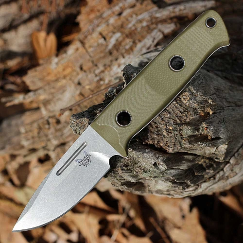 The Benchmade Mini Bushcrafter 165-1 is shown open, featuring a 3.38-inch Stonewashed CPM-S30V drop point full-tang blade, OD Green G-10 handle scales, lanyard hole, and an included leather belt sheath.