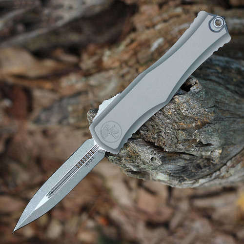 Microtech Herra II D/E (1702-10 APNC) 4" Premium Steel Bead Blasted and Stonewashed Double Edge Dagger Plain Blade, Natural Clear Aluminum Handle w/ Double-Action Thumb Slide