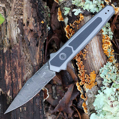 Kershaw Launch 17 7951DAM automatic knife open view showing the 3.5-inch Damascus clip point blade and gray handle.