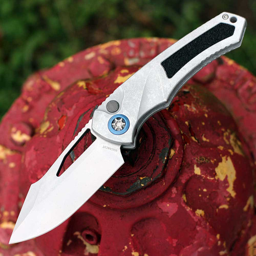 Heretic Knives Pariah Manual (H046-2A-BLZ) 3.75" MagnaCut Drop Point Stonewash Plain Blade, Blizzard Aluminum with Black Traction Inserts, Blue Titanium Pivot Collars, Battleworn Hardware, Machined Ball Clip