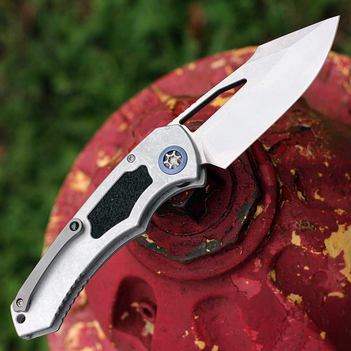 Heretic Knives Pariah Manual (H046-2A-BLZ) 3.75" MagnaCut Drop Point Stonewash Plain Blade, Blizzard Aluminum with Black Traction Inserts, Blue Titanium Pivot Collars, Battleworn Hardware, Machined Ball Clip