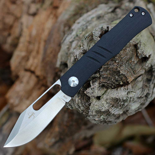 Boker Plus Sliplock 01BO975 folding knife profile view showing 14C28N satin clip-point blade and black G-10 handle.