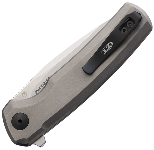 Zero Tolerance (ZT0044)  3.2" S45VN Stainless Drop Point Plain Blade, Bead Blast Titanium Handle, Black-Oxide Pivot Nut with a Teal-Anodized Button Collar, Teal-Anodized Tube Spacer, Black Cerakote Pocket Clip