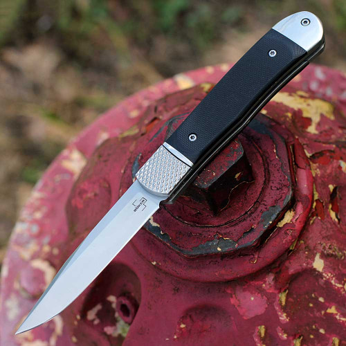 Boker Plus Hidden Release Trapper (01BP0028) 3.14" D2 Satin Drop Point Plain Blade, Black G-10 Handle, Hidden Bolster Release