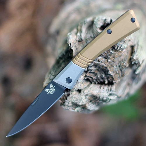 The Benchmade Successor Slipjoint 315BK-01 is shown open, featuring a 2.60-inch Black DLC-coated Böhler M390 drop point blade extending from a Burnt Brass handle with nail nick opener and tip-up pocket clip.