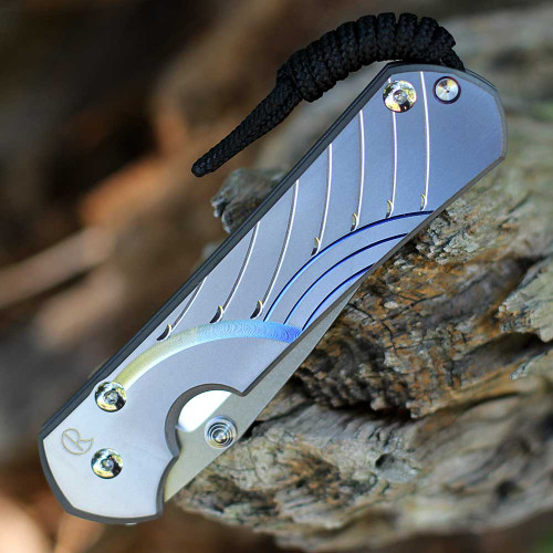 Sebenza 31 sandblasted titanium handle with unique graphic close-up