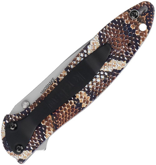 Detailed close-up of the UFI Snake Skin texture on the aluminum handle scales of the Kershaw Leek.