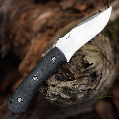 Contoured artisanal carbon fiber scales on G10 liners, texture close-up