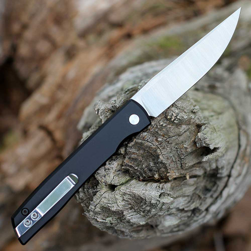 Boker Urban Trapper NXT being deployed highlighting the snappy automatic action and ball-bearing pivot.