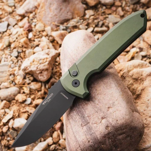 Pro-Tech Rockeye LG3103 green in hand, 8.375 inch overall, 4.64 oz, automatic knife Les George design