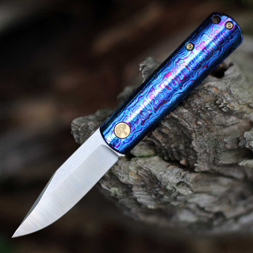 Boker Germany BRLW Mokuti 110674 open — CPM MagnaCut drop point blade, Mokuti violet blue iridescent handle, gold hardware, Liner Lock