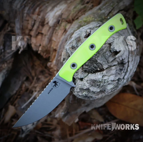 A Microtech Akris fixed blade hunting knife shown alongside its black Kydex sheath, highlighting the M390MK stonewash blade and high-visibility G-10 handle.