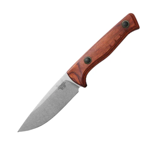 The Benchmade SlipRidge™ Fixed Blade (15650) shown with its 3.7-inch CPM MagnaCut stainless drop-point blade in a satin finish, stabilized dark brown wood handle with a deep finger choil, and its modular OD Green Boltaron® sheath. The high tip and full belly of the drop-point profile are visible alongside the contoured pinch points on the spine, built for both precision detail work and heavier big-game processing.