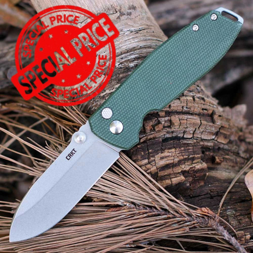 The CRKT Squid XM (CR2495GR) shown with its 2.95-inch D2 stonewashed drop point blade, hybrid handle pairing a green Micarta front scale with a stonewashed stainless steel back, and its low-profile deep-carry pocket clip. The flipper tab, button lock, and IKBS ball bearing pivot are visible along the spine of this fast-deploying EDC folder, currently offered at a special limited-quantity price.