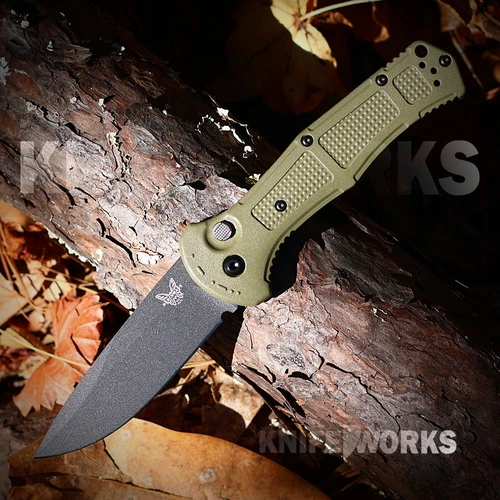 The Benchmade Claymore Auto 9070BK-03 is shown open, featuring a 3.60-inch Black Cerakote CPM-D2 drop point blade extending from a Ranger Green Grivory handle with matrix grip texturing, push-button firing, and integrated safety lock switch.
