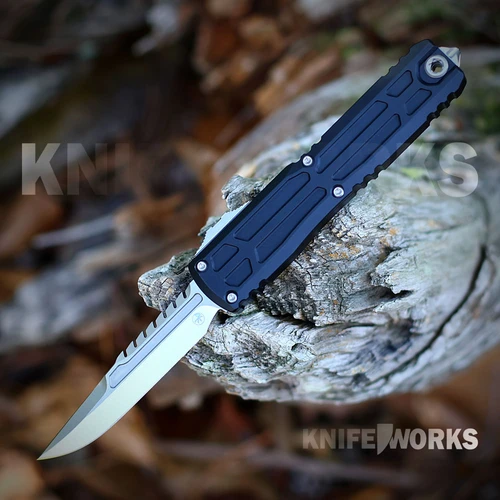 The Microtech Ultratech Gen III is shown with its stonewashed blade deployed from the front of the aluminum handle. The thumb slide is visible on the handle, along with Torx screws.