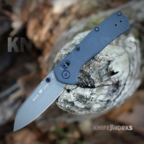The Buck Range Ops Pro 0797BLS1 is shown open, featuring a gray Cerakote 154CM reverse tanto blade, crossbar lock, and blue GFN handle with a deep-carry pocket clip.