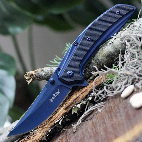 Kershaw Outright 8320 open profile view showing the blue trailing point blade and matching blue stainless steel handle.