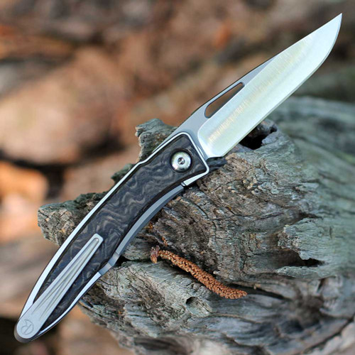 Showing the Gen 3 thru-hole nail nick and hollow-ground blade profile.