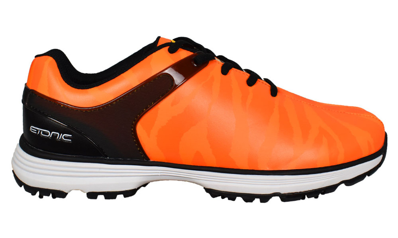 orange and white golf shoes