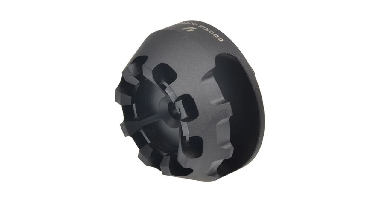 Compensator Compensator on rifle barrel with upward gas ports to control muzzle rise.
