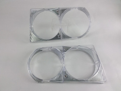 URO Parts Headlight Bezel Doors, Pair New C107 R107 US