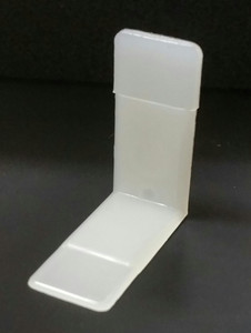 Polyethylene drawer corner saddle. Rite Trak II, Rite Track II, Drawer Guide, Rite-Trak II Drawer Guide Metal Backing, Commercial Grade Drawer Guide, Buy Dresser Drawer Guide, Dresser Drawer track Guide, Handy Kenlin Drawer Guide, Replacement Drawer Guide, Buy Dresser Drawer Guide, Dresser Drawer track Guide, Handy Kenlin Drawer Stop, Rite-Trak II Drawer Stop, Replacement Drawer Stop, Buy Dresser Drawer Stop, Dresser Drawer track Stop, Rite-Track I, Rite-Trak I, Rite-Trak II Drawer Stop w/ Roller, Drawer stop with roller, Drawer track replacement parts, Drawer stop